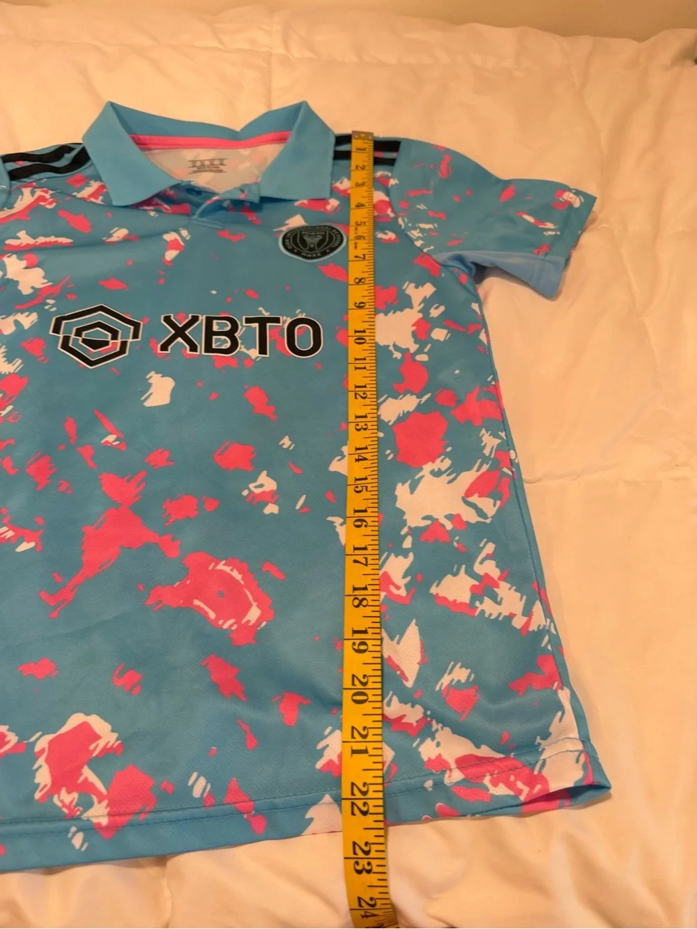 Kids' Aqua Polo with Pink & White Splash Print, team copy Messi size Large